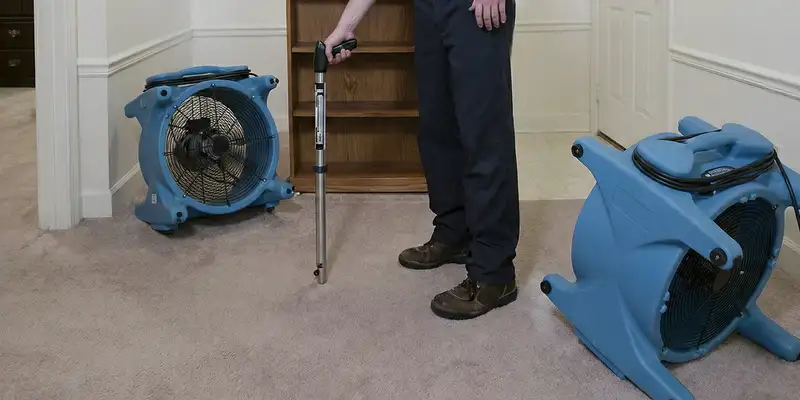 emergency water removal equipment deployed to dry a flooded residential interior in Chicago, IL