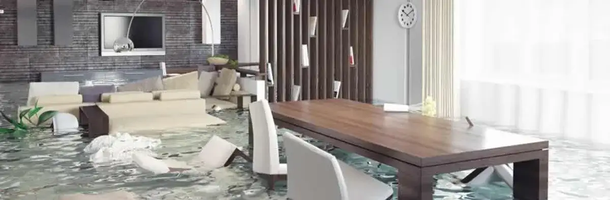 home interior affected by water damage with flooded floors and displaced furniture in Chicago, IL